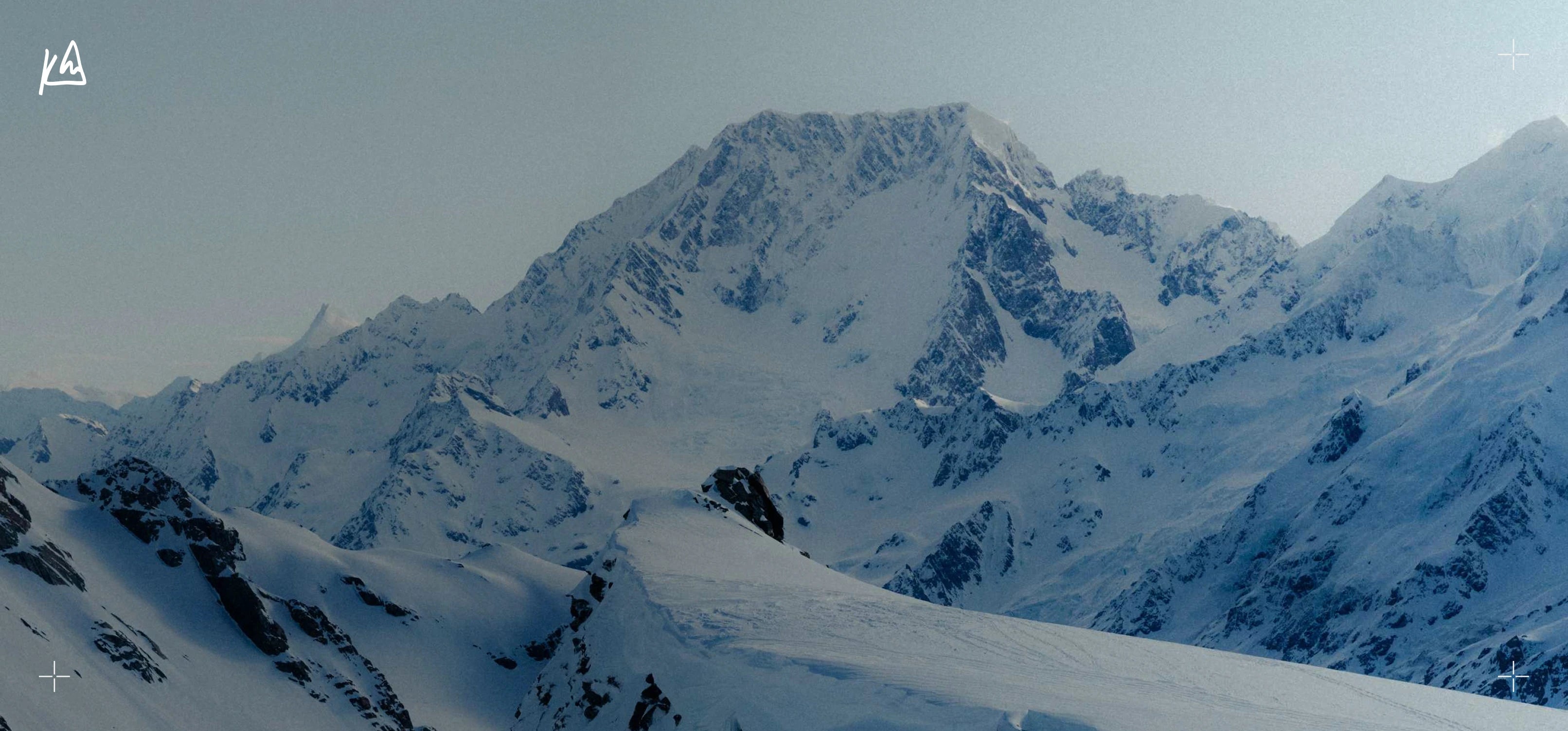 Snowy mountain landscape with a clear sky